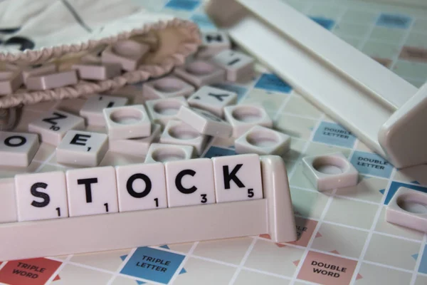 Closeup White Cubes Spelling Word Stock Board Game — Stock Photo, Image