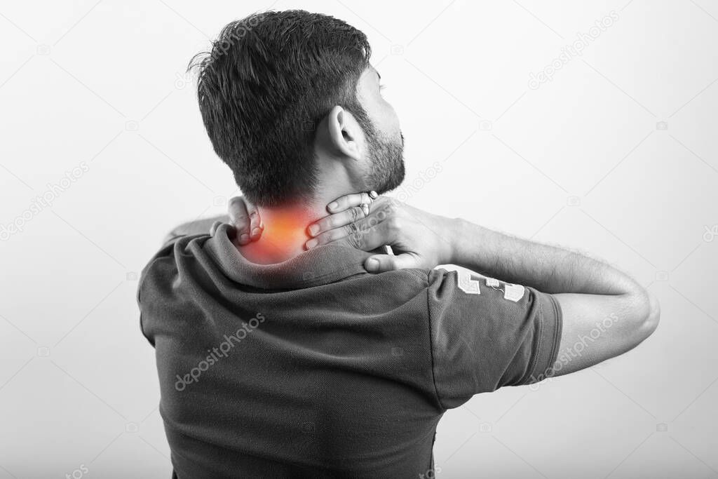 Isolated white background an asian guy with inflamed neck injury pain highlighted in glowing red.