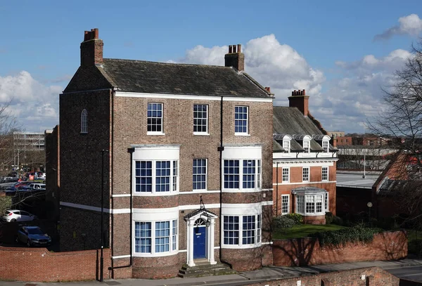 A Historic Georgian house with bow windows at 25 Jewbury, York, UK.