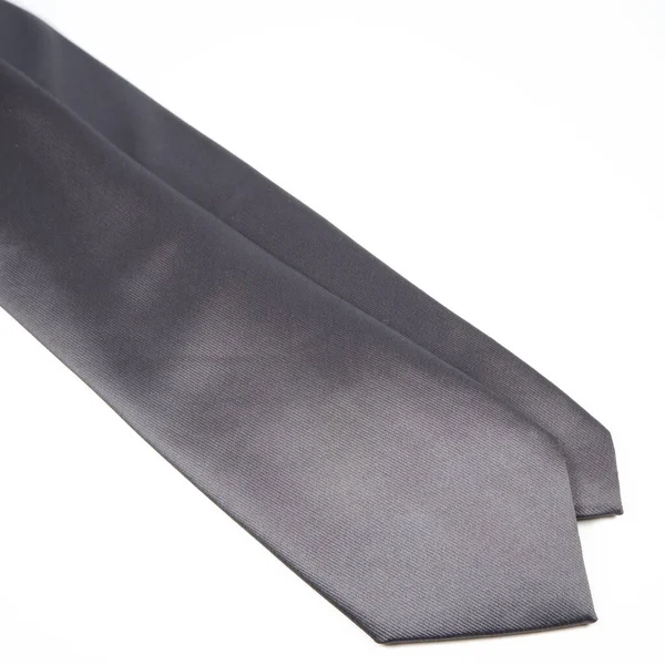 Primer Plano Una Elegante Corbata Gris Aislada Sobre Fondo Blanco — Foto de Stock