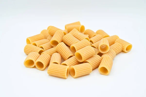 Closeup Raw Rigatoni Pasta White Background — Stock Photo, Image