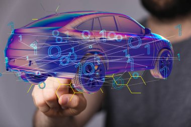 Bir arabanın 3 boyutlu hologramı ve arka planda tıkırdayan bir elle havada asılı duran ikili kod.