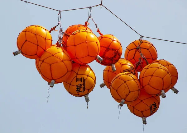 Low Angle Shot Orange Hanging Fishing Floats Marsascala Clear Sky — Stock Photo, Image