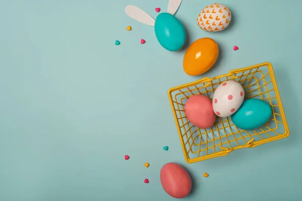 Top View Shot Colorful Easter Eggs Basket Blue Background Copy — Stock Photo, Image