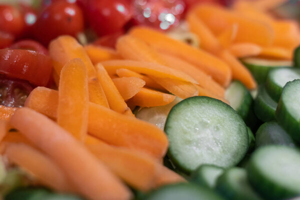 A salad bowl full of fine chopped fresh vegetables
