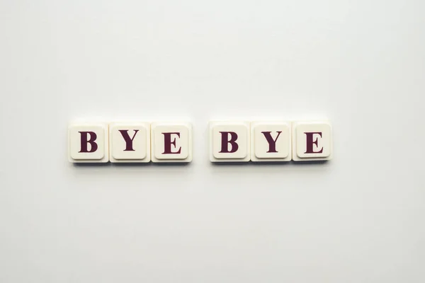 Closeup Scrabble Tiles Letters Spelling Message Bye Bye White Background — Stock Photo, Image