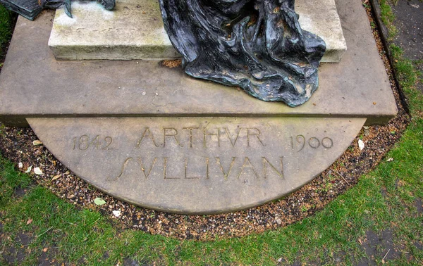 The name plaque on the base of the memorial to Arthur Sullivan by William Goscombe John