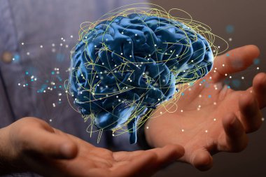 İnsan beyninin bir adamın ellerinde süzülen 3 boyutlu görüntüsü.