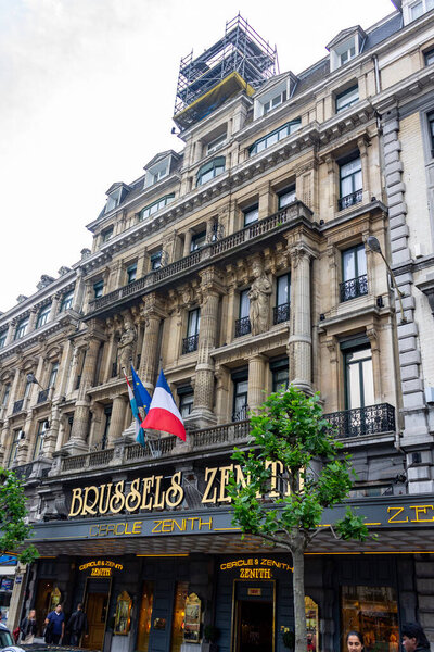 The historical flemish building with a flag in downtown Brussels, Belgium, Europe