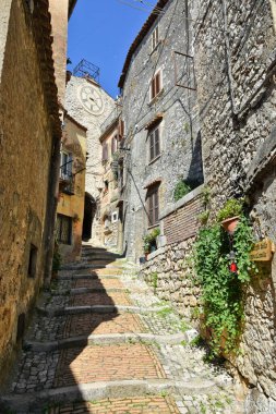 A narrow street among the houses of Castro dei Volsci in the Lazio region of Italy