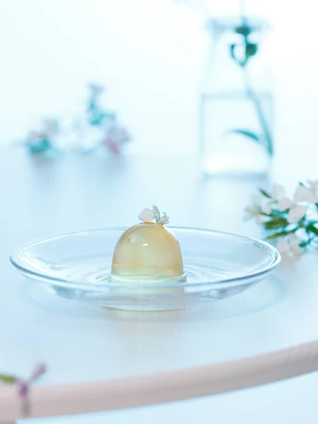 A vertical shot of jelly dessert on a plate on a table