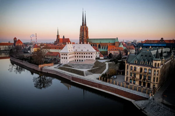 A aerial shot of old european buildings and cathedral towers in Wroclaw, Poland