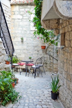 A cafe table in the medieval quarter of Trogir, an old Croatian town