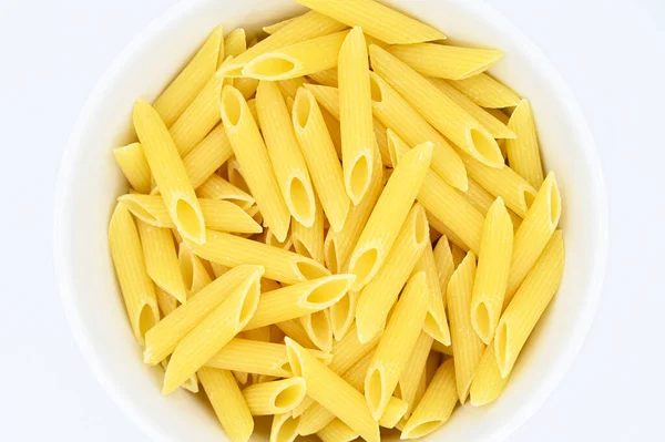 Top View Raw Penne Pasta White Background — Stock Photo, Image