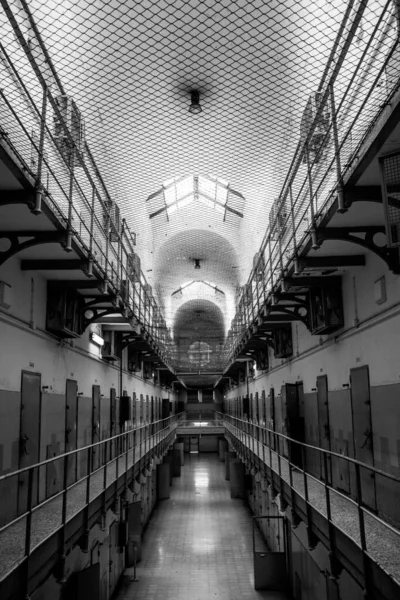 Vertical Shot Big Hall Looks Jail Big Number Doors Grayscale — Stock Photo, Image