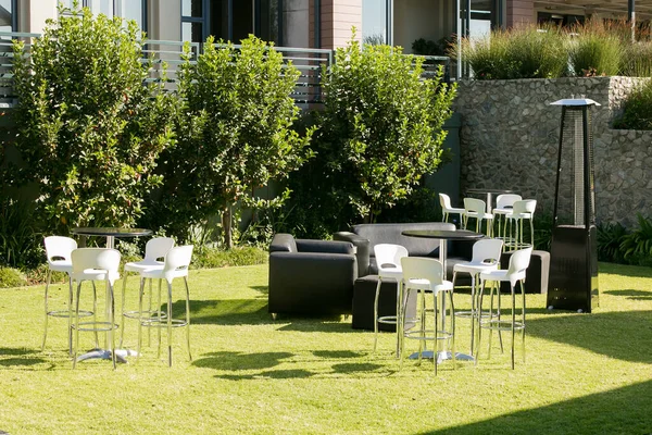 An outdoor view at an event venue with garden furnitures in Johannesburg, South Africa