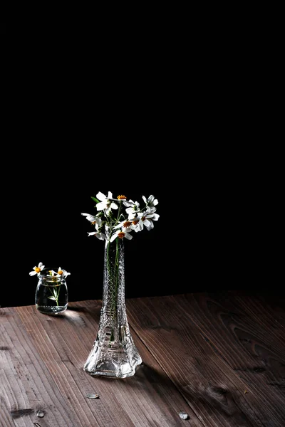 Vertical Closeup Transparent Vases Flowers Wooden Table Dark Background — Stock Photo, Image