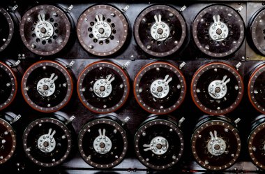 A closeup shot of indicator dials from the famous Bombe machine at Bletchley Park clipart