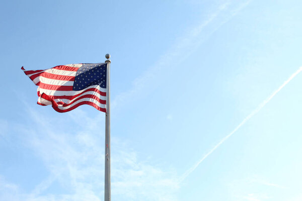 The US flag fluttering in the wind