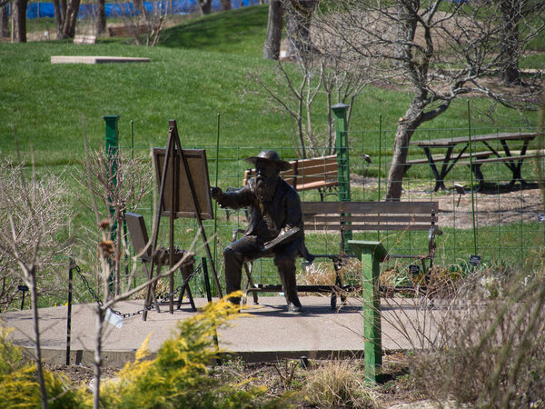 The bronze sculpture of Claude Monet at the Overland Park Arboretum, United States