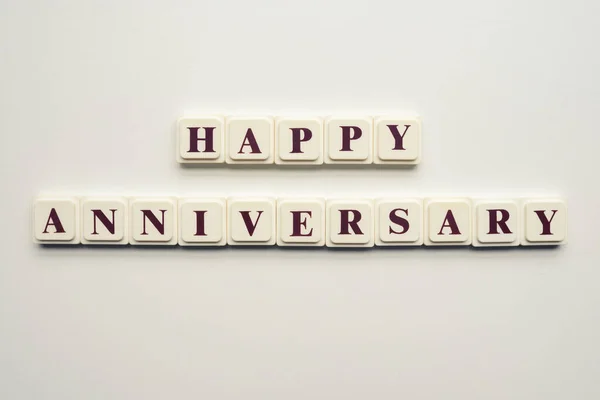 Closeup Scrabble Tiles Letters Spelling Happy Anniversary White Background — Stock Photo, Image