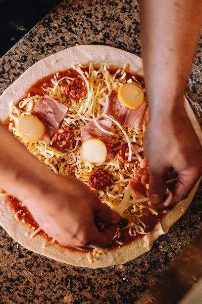 Top View Hands Adding Cheese Sausage Pizza — Stock Photo, Image