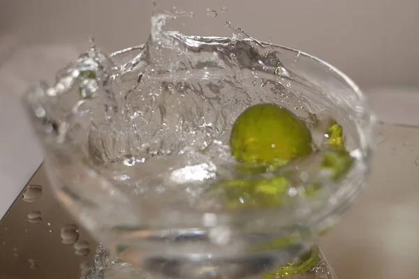 Closeup Shot Olive Splashing Cup Martini — Stock Photo, Image