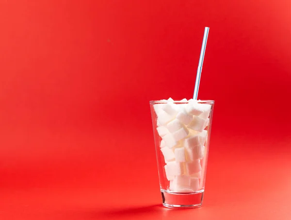 Glass Sugar Cubes Drinking Straw Red Background — Stock Photo, Image