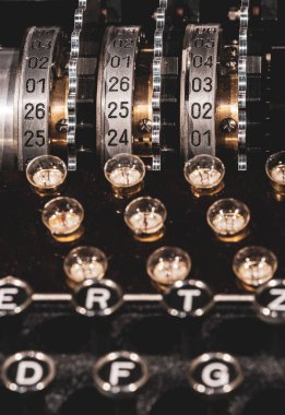 A closeup shot of the historical Enigma machine cipher device used in the early- to mid-20th century clipart