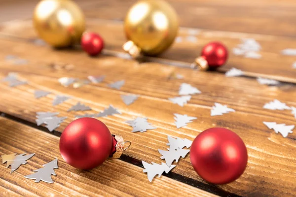 Closeup Shot Red Gold Christmas Balls Wooden Background — Stock Photo, Image