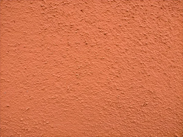 コピースペース付きオレンジ塗装石壁のテクスチャ — ストック写真