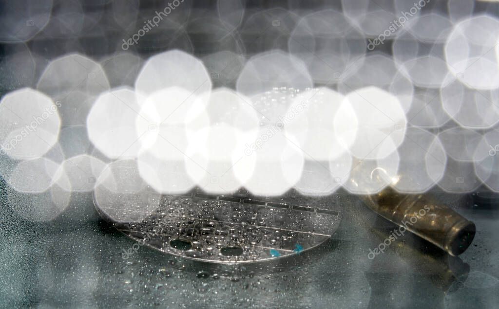 An abstract blurred glares on a glass surface