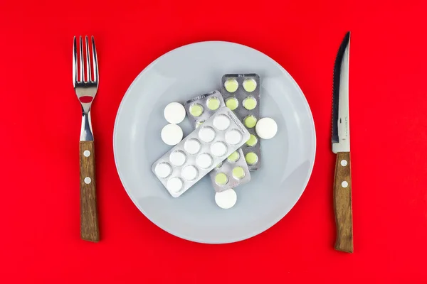 Top View Table Setting Plate Full Pills Red Background — Stock Photo, Image