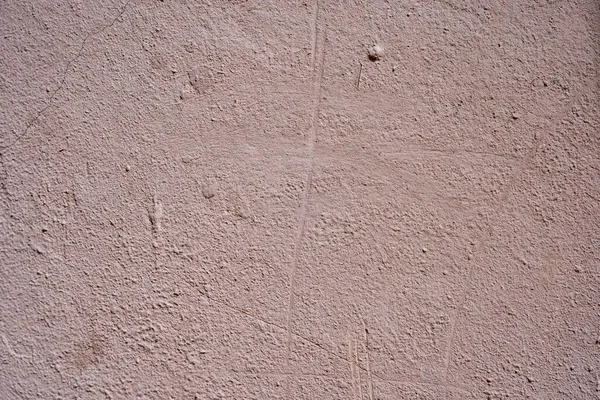 Zbliżenie Bladej Różowej Kamiennej Powierzchni Ściany — Zdjęcie stockowe