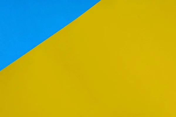Mavi Sarı Kağıtlardan Oluşan Bir Duvar Kağıdı — Stok fotoğraf