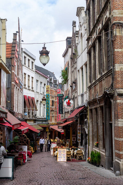 A vertical of boutiques in historical buildings in downtown Brussels, Belgium, Europe
