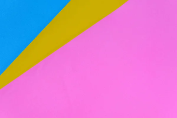 A wallpaper of blue and yellow and pink papers