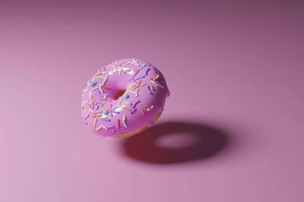 분홍색 배경에 물줄기가 도넛을 — 스톡 사진
