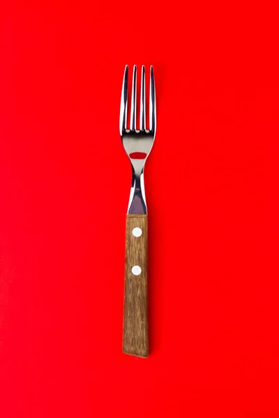 Vertical Top Shot Silver Fork Bright Red Background — Stock Photo, Image