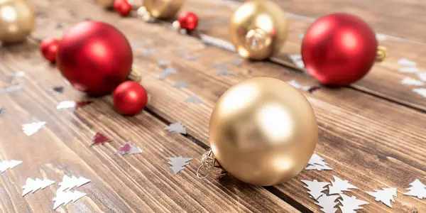 Closeup Shot Red Gold Christmas Balls Wooden Background — Stock Photo, Image