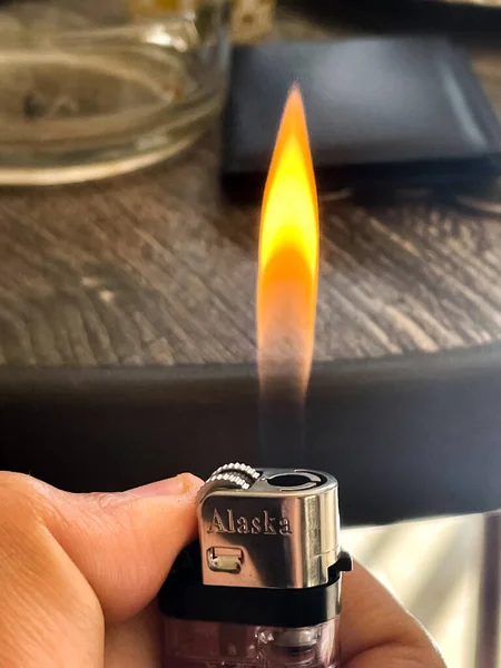 Unrecognizable Hand Holding Lighter — Stock Photo, Image