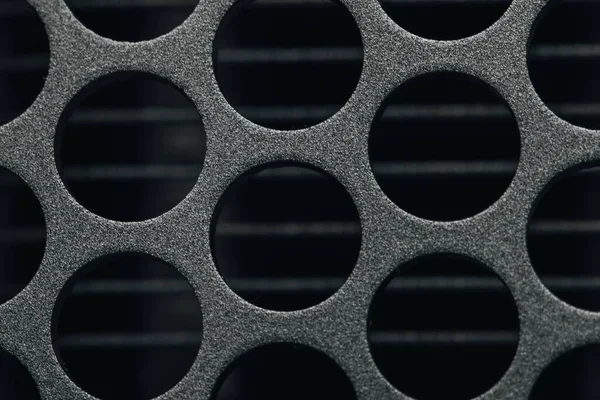 Closeup Metal Holes Black Background — Stock Photo, Image