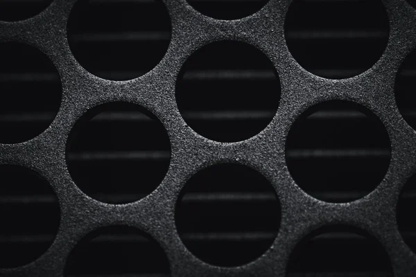 Closeup Metal Holes Black Background — Stock Photo, Image