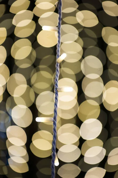 Julbelysningen Med Levande Gula Bokeh Lampor Bakgrunden — Stockfoto