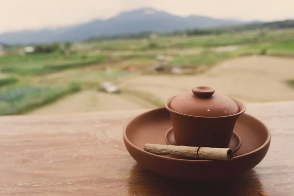 Closeup Shot Traditional Chinese Tea Pot Blurred Green Fields Blue — Stock Photo, Image