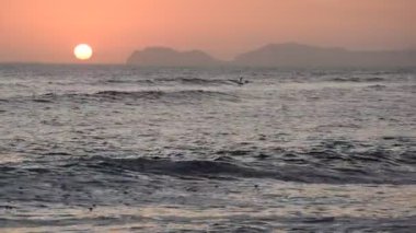 View of  the coastline and  at sunset in Lima, Peru
