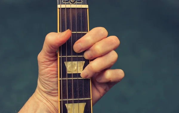 Closeup Hand Holding Chord Neck Acoustic Guitar Backgrounds — Stock Photo, Image