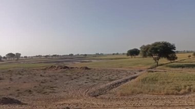 Pakistan 'da günbatımında panoramik bir manzara