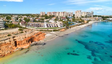 The aerial shot  Dehesa de Campoamor coastal townscape with sandy beach Costa Blanca,  Spain clipart