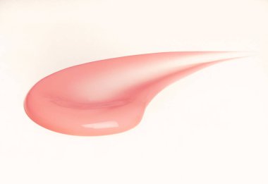 Pembe bir cilt ürünü dalgalı doku vuruşu..